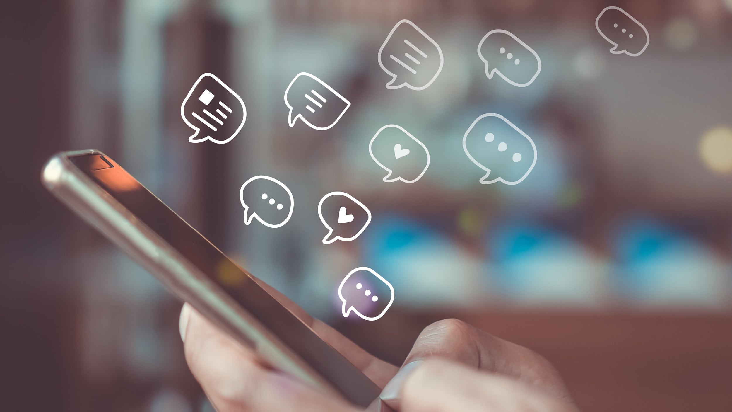 C-Leveled Legacy Blog | How to Increase Social Media Engagement | Icons Emerging from Phone