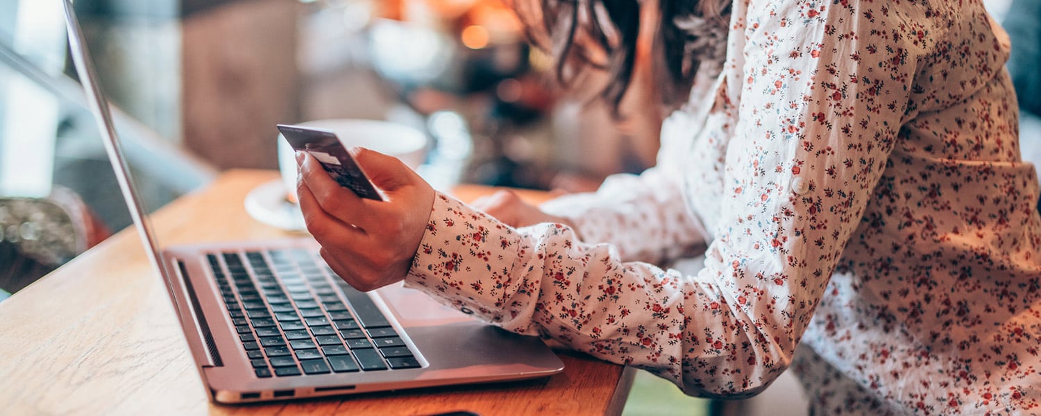 E-Commerce Marketing | E-Commerce Advertising | Woman Completing Online Purchase