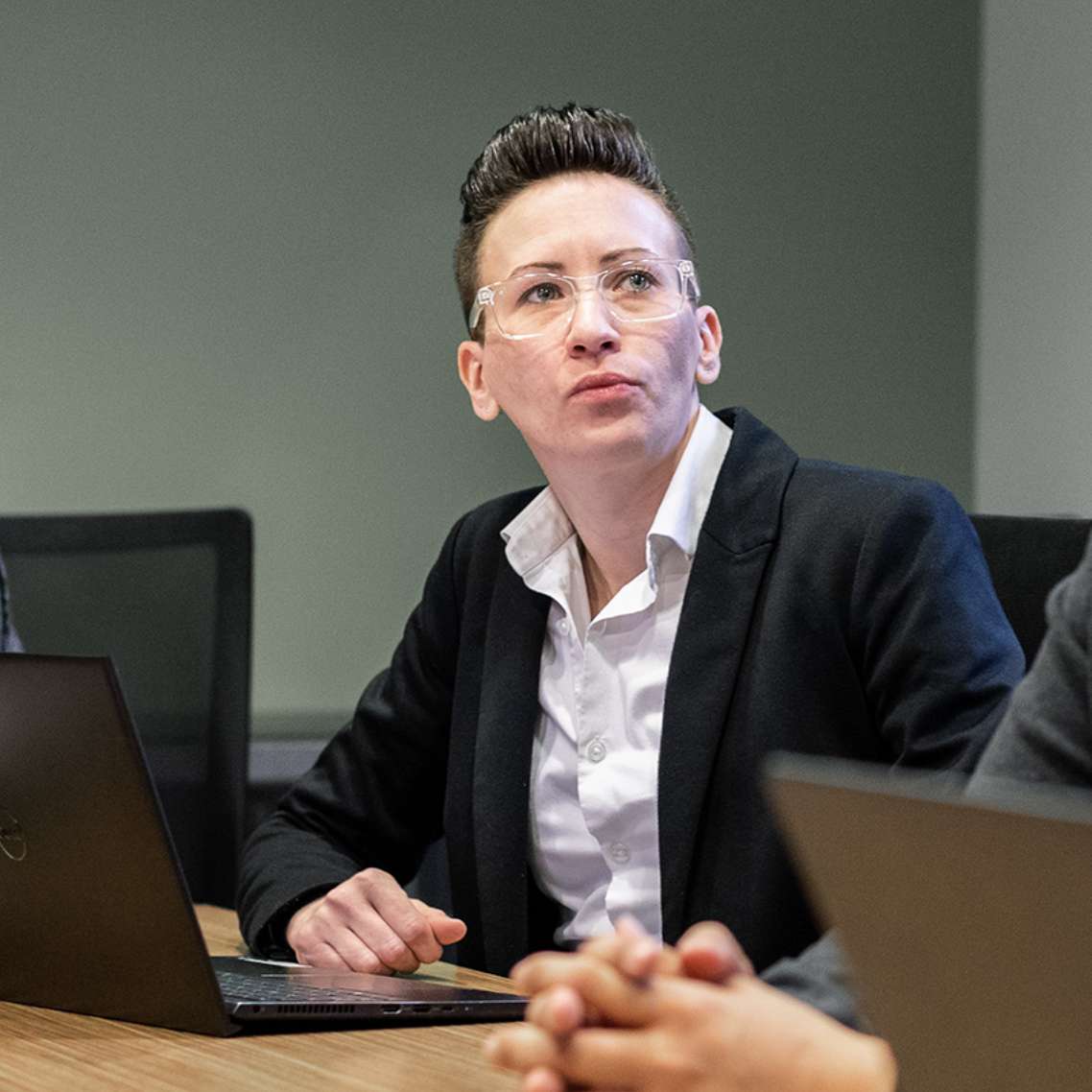 Digital Analyst in a meeting