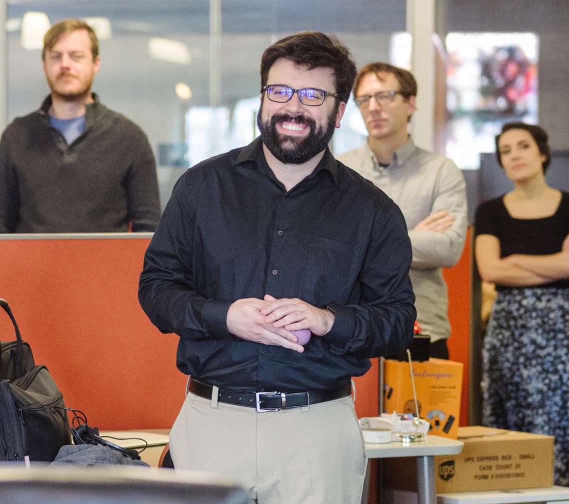 Digital Analyst at team meeting