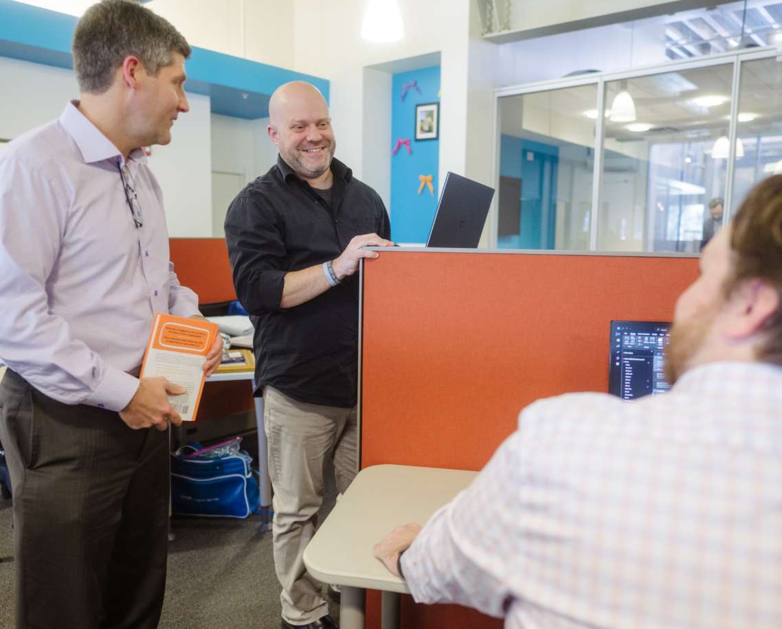 Justin Seibert meeting with team