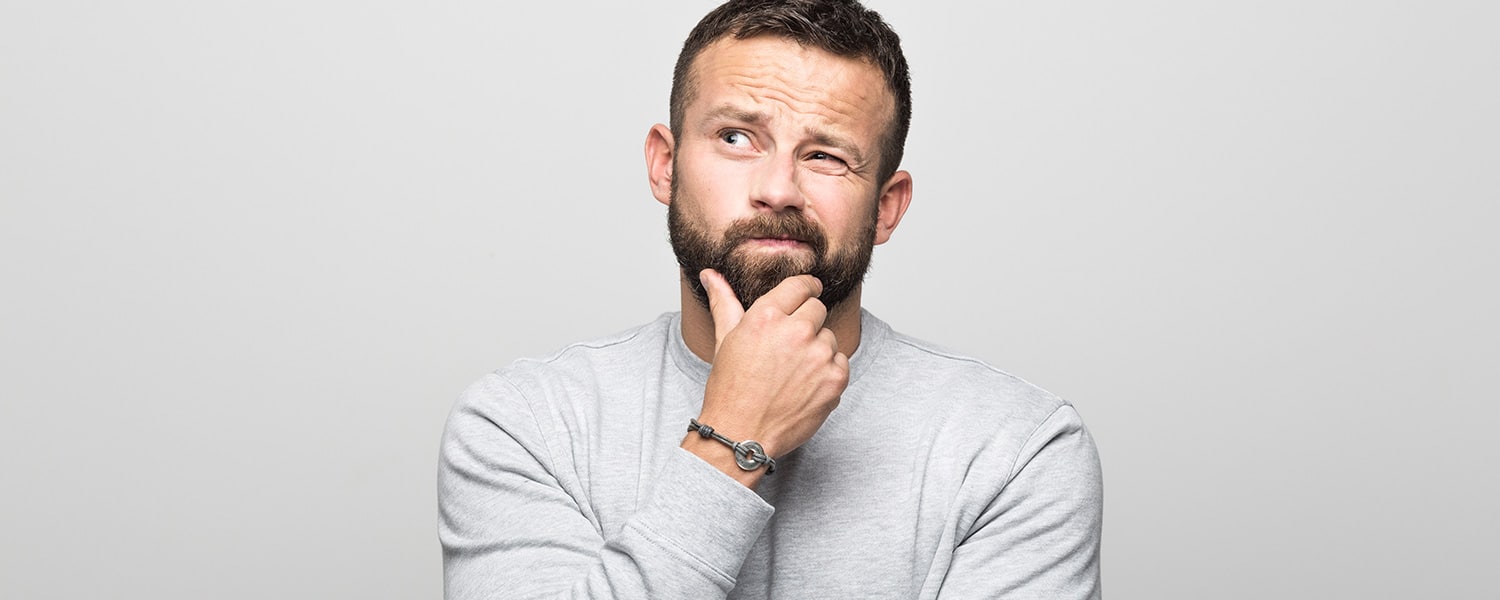 Rebranding Services | Rebrand vs. Refresh | Man Deep in Thought